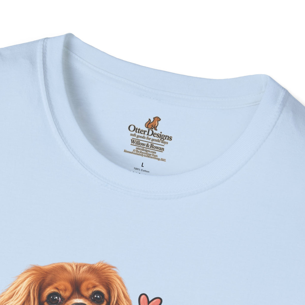 Close-up of the light blue T-shirt neckline with the Otter Designs Willow & Rowan printed inner label.
