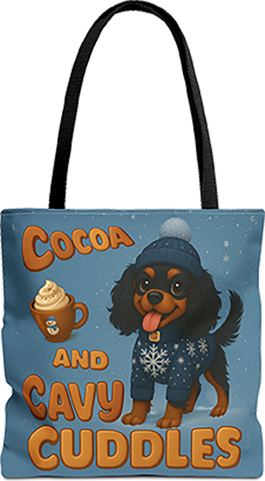 Cocoa and Cavy Cuddles tote bag with black handles, Black and Tan Cavalier King Charles Spaniel puppy in a beanie and sweater with a mug of cocoa
