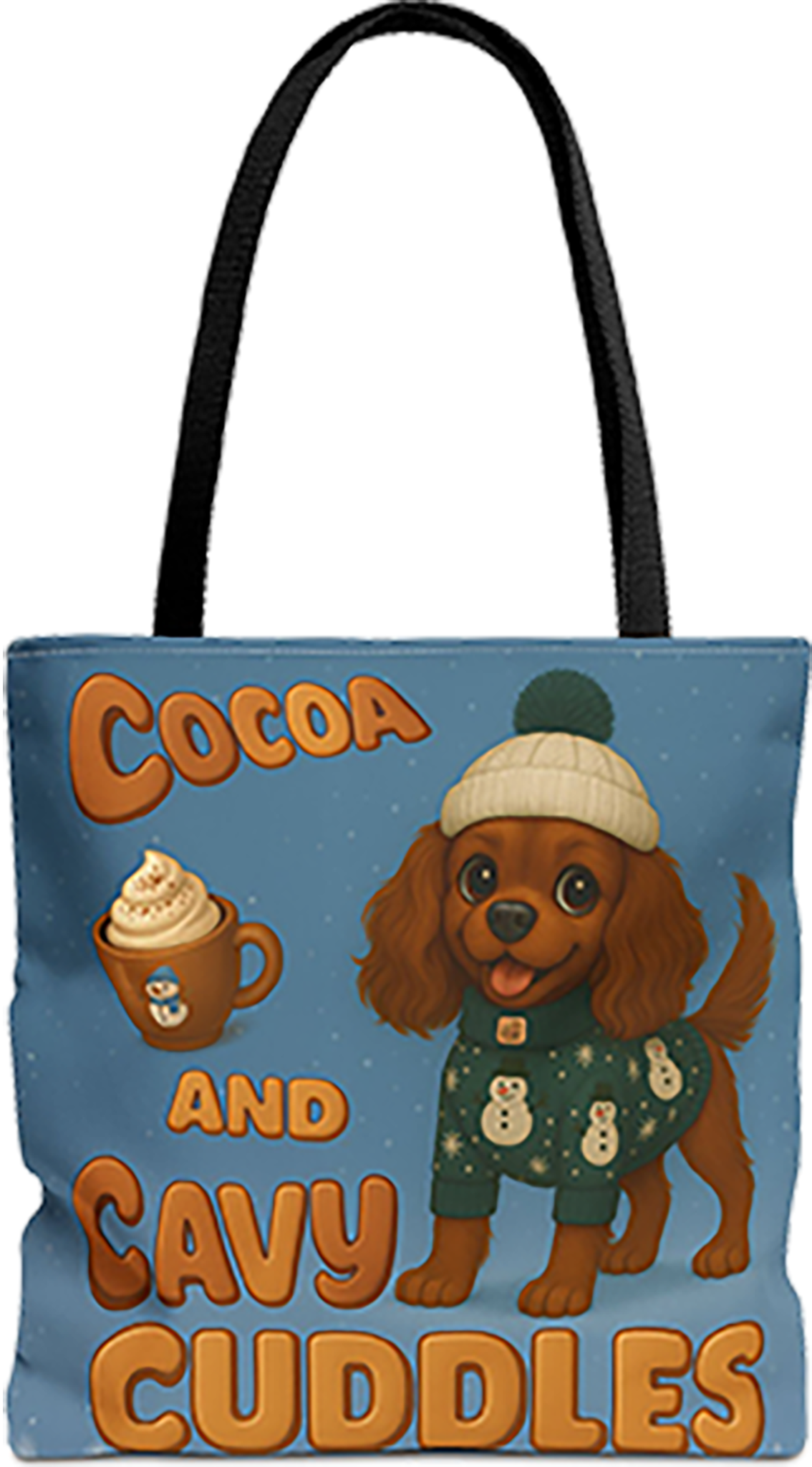 Cocoa and Cavy Cuddles tote bag with black handles, Ruby Cavalier King Charles Spaniel puppy in a beanie and sweater with a mug of cocoa