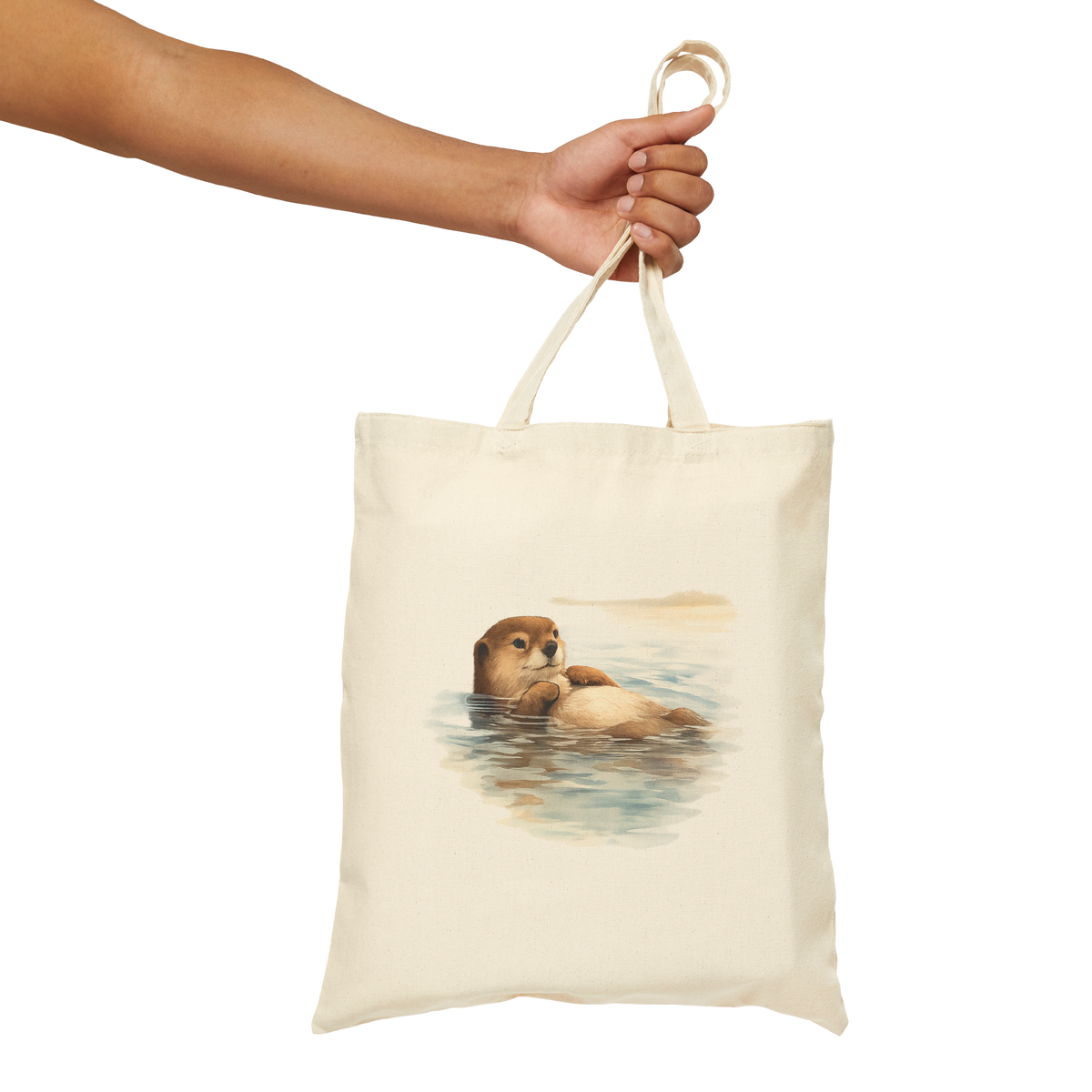 Sea otter floating at rest on a natural cotton canvas tote